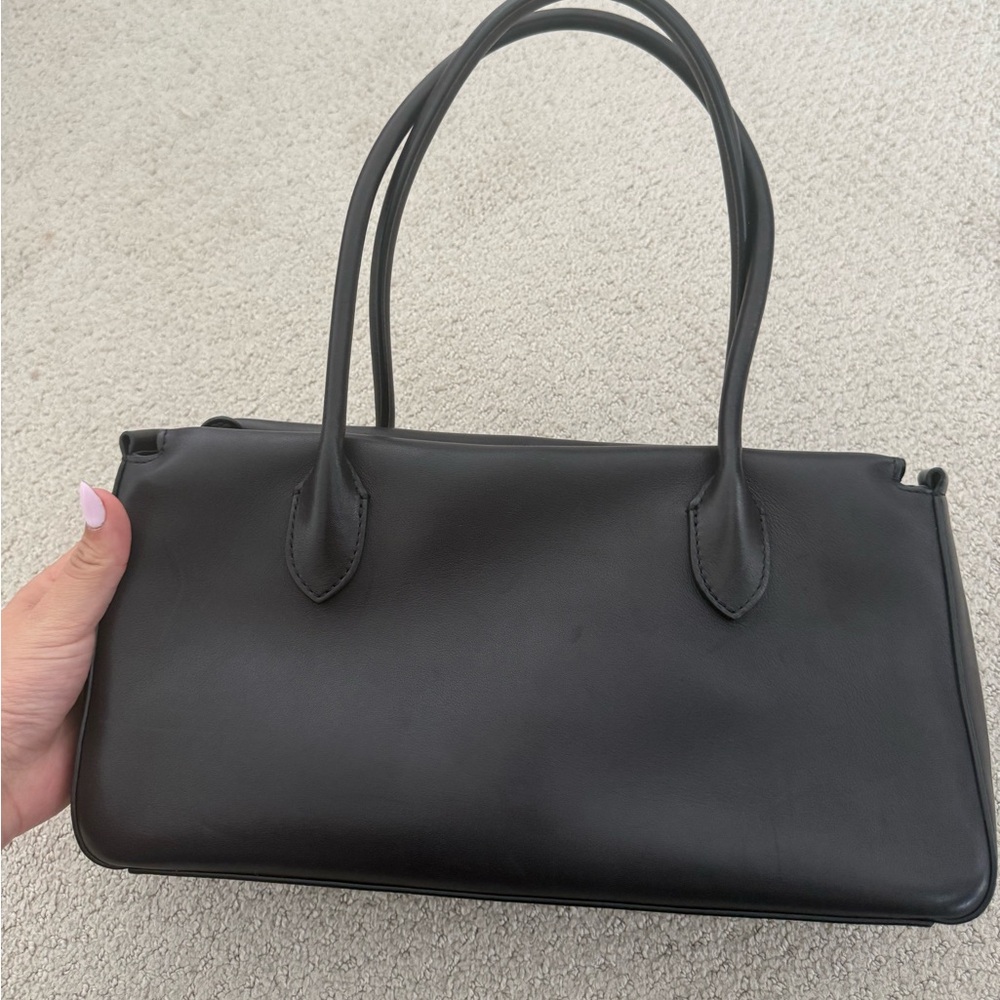 The row E/W leather black shoulder bag